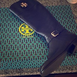 Tory Burch knee high boots.